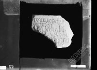 Marble fragment with remains of inscriptions in six lines