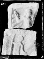 Fragment of RELIEF with schematized picture of naked warrior with spears in its top section 