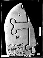 Fragment of GRAVESTONE with cross and inscription