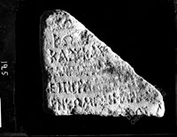 Fragment of marble slab with inscription about sports competition