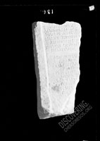 Fragment of inscribed marble slab