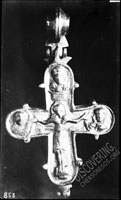 Reliquary cross with relief image of the Mother of God with Jesus and three saints in medallions on ends of the cross
