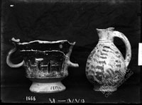 Glazed (?) doble-handled vessel no. 1877/11 to the left, ninth or tenth century glazed pitcher to the right