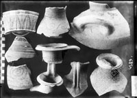 Fragments of PITCHERS. Ornamentation made in red colour as strips and garlands